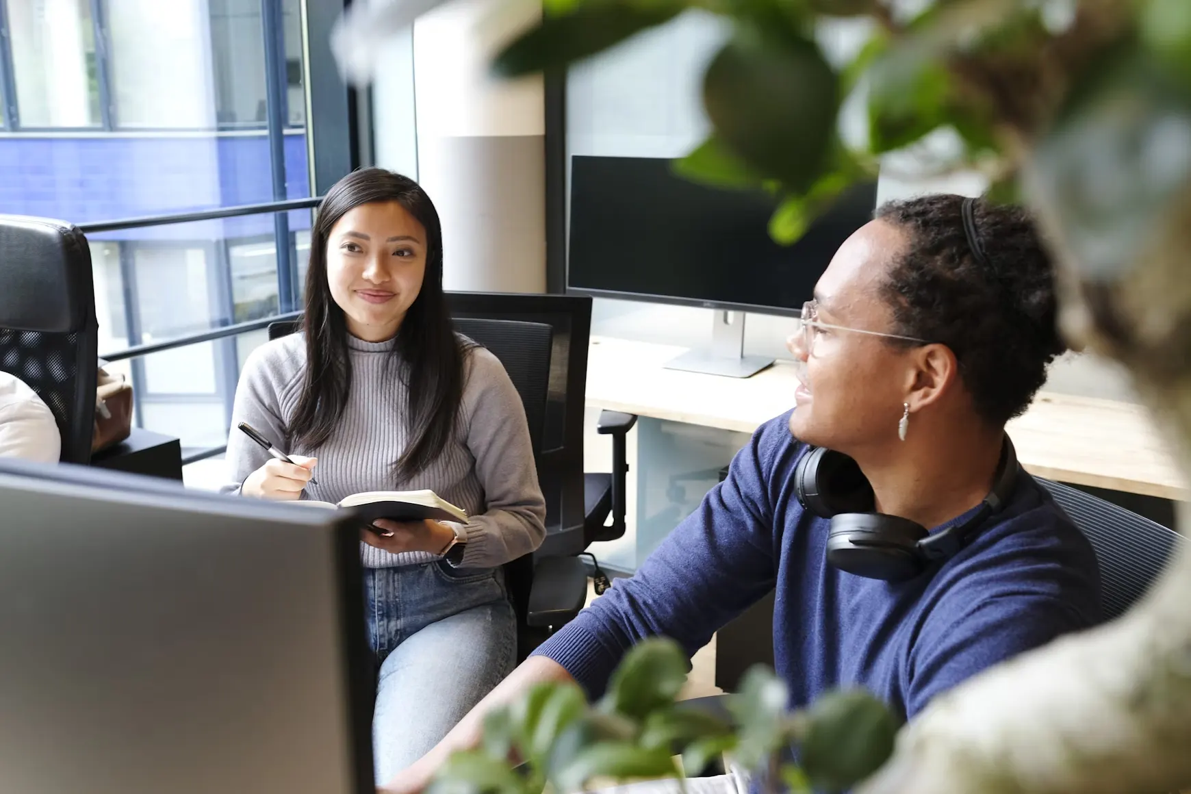 An SEO consultant reviewing search data with a client